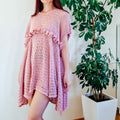 Light pink blush ruffle summer dress by Loops Only featuring a flowy fabric and a sleeveless design.