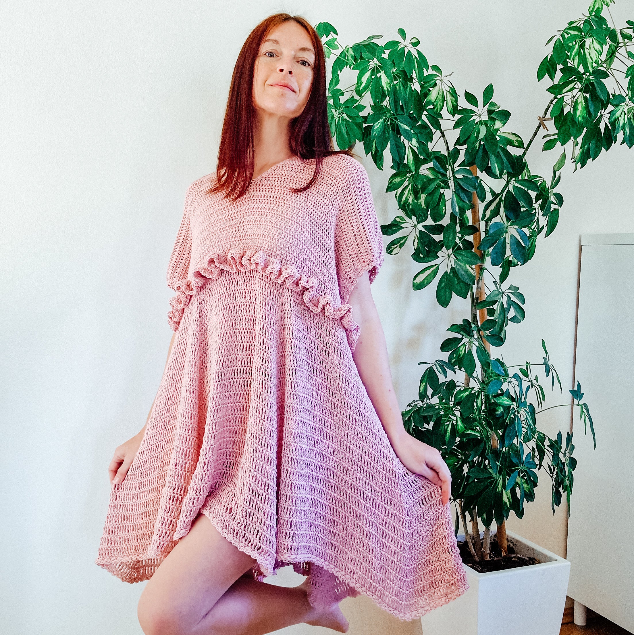 Loops Only blush ruffle summer dress with lightweight fabric and floral design, perfect for warm-weather occasions.