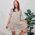 Loops Only Granny Square Summer Dress with colorful crochet pattern, sleeveless design, and lightweight fabric for warm weather.