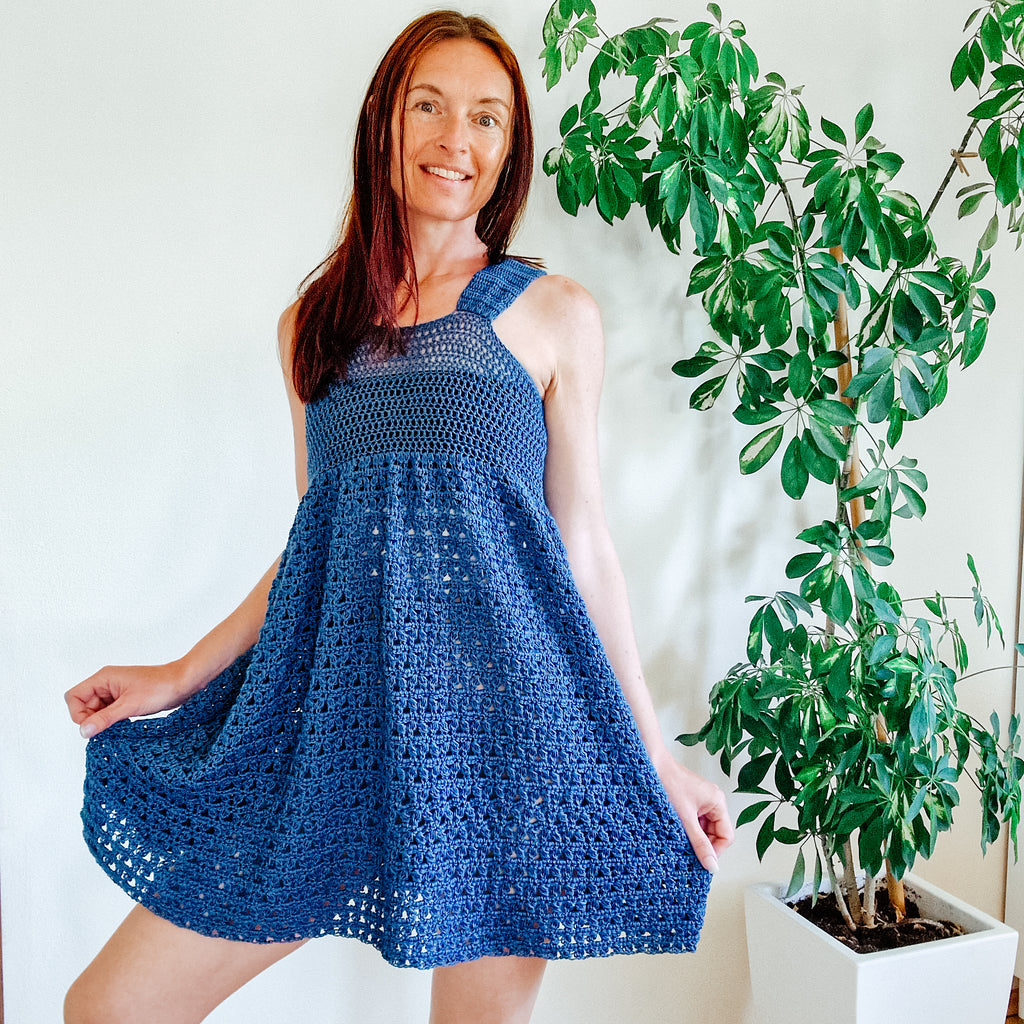 Cherry Blossom Babydoll summer dress by Loops Only, featuring lightweight fabric, floral pattern, and relaxed fit.