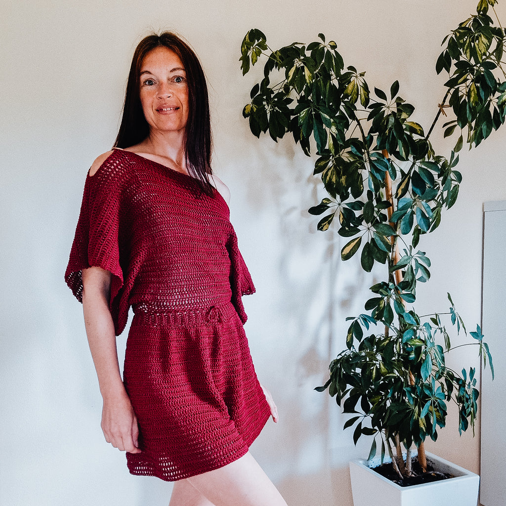 Loops Only Easy Summer Breeze romper with shorts, lightweight fabric, and casual style, displayed on a hanger.