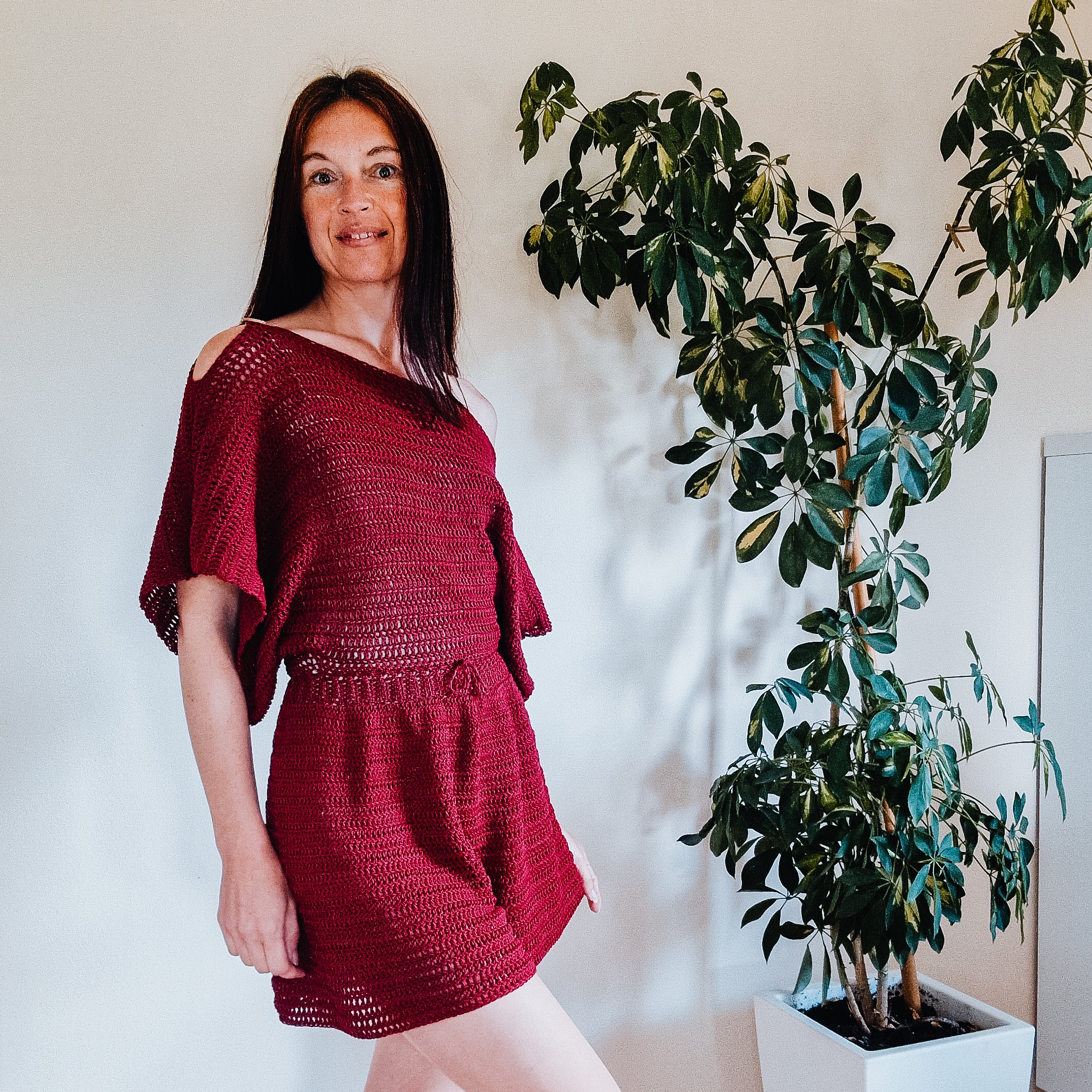 Loops Only Easy Summer Breeze romper with shorts, lightweight fabric, and casual style, displayed on a hanger.