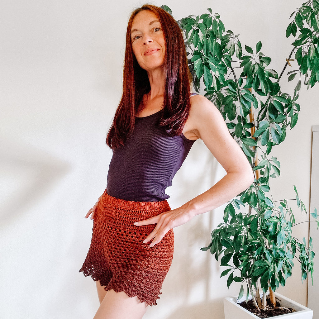Loops Only Boho Granny Stitch Shorts shown in natural fabric with a relaxed fit and intricate stitch detailing.
