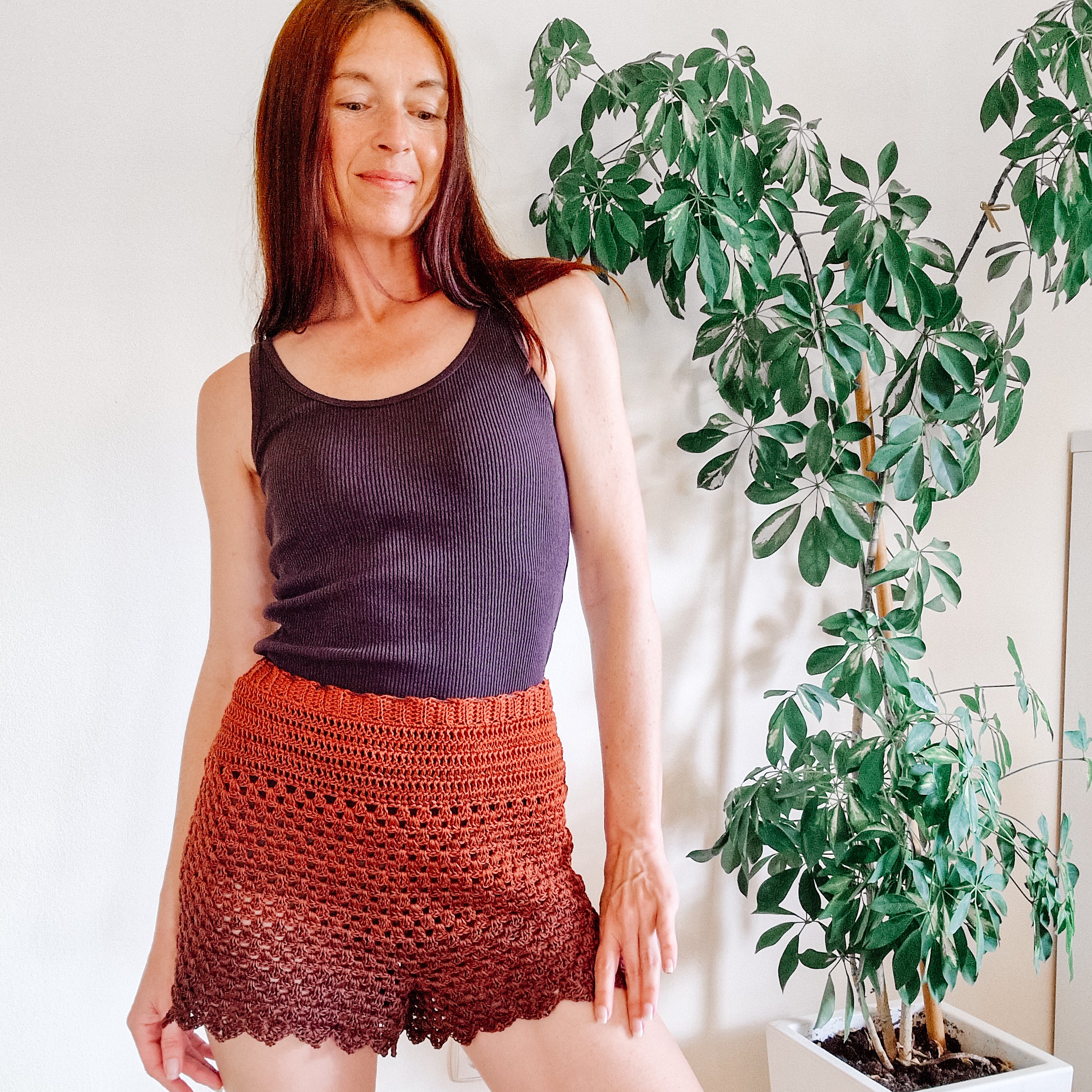 Loops Only Boho Granny Stitch Shorts in neutral tones, featuring a relaxed fit and intricate crochet details.