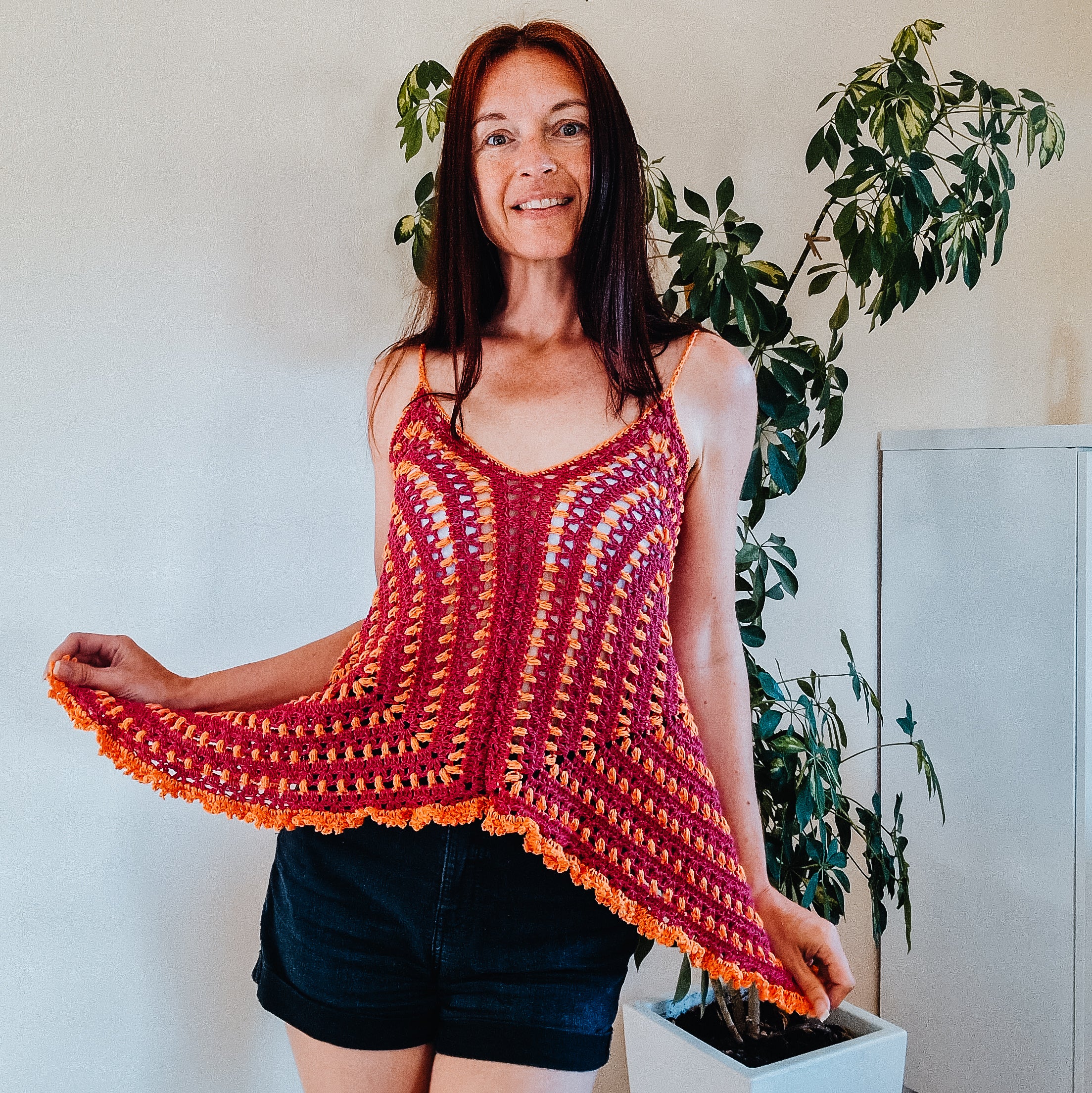 Colorful Puff Stitch Granny Square crochet top by Loops Only, featuring vibrant granny square patterns and a fitted design.