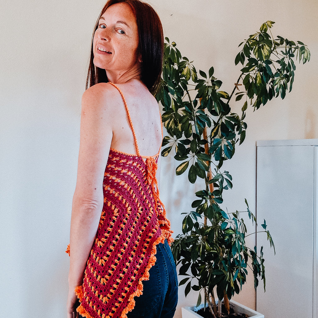Loops Only Puff Stitch Granny Square Top showing colorful, textured crochet design on a stylish women's top.