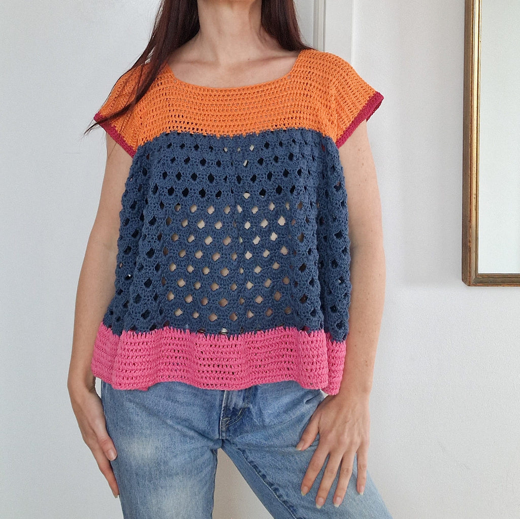 Colorful arcade-style block top by Loops Only, featuring vibrant geometric patterns and a casual fit for everyday wear.