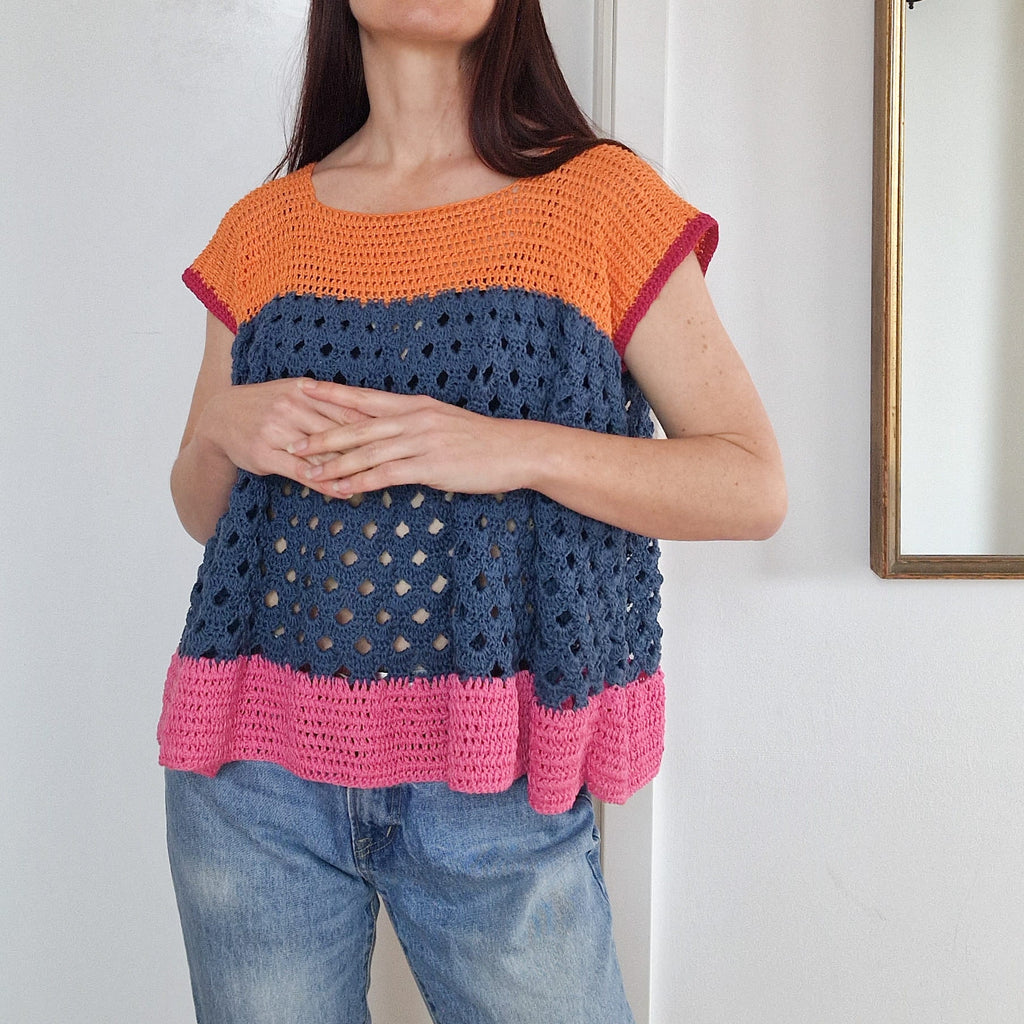 Colorful arcade-inspired Loops Only color block top with vibrant geometric patterns and long sleeves, casual fashion for women.