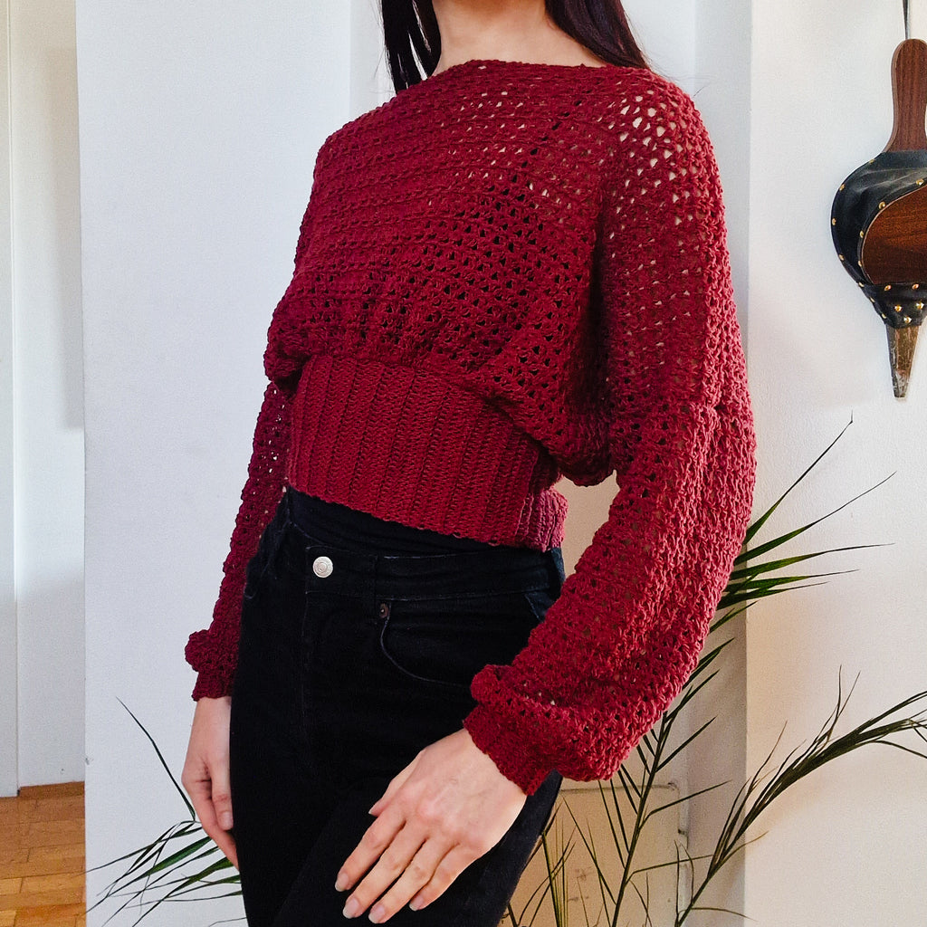 Crochet cropped sweater with bishop sleeves from Loops Only, featuring intricate stitch details and a stylish, cozy design.