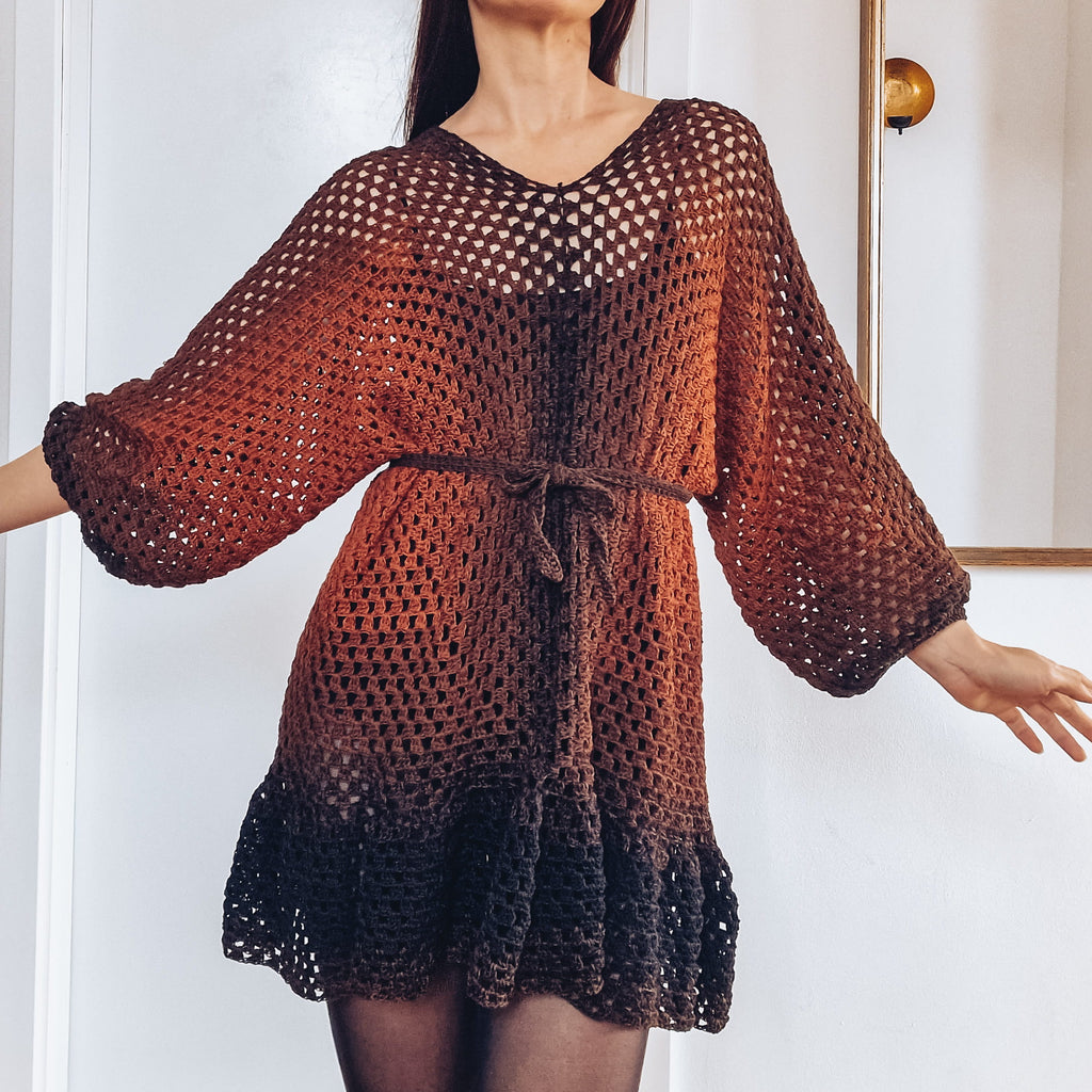 Loops Only Ember crochet cover-up dress with ruffle hem, lightweight and stylish for beach or poolside wear.