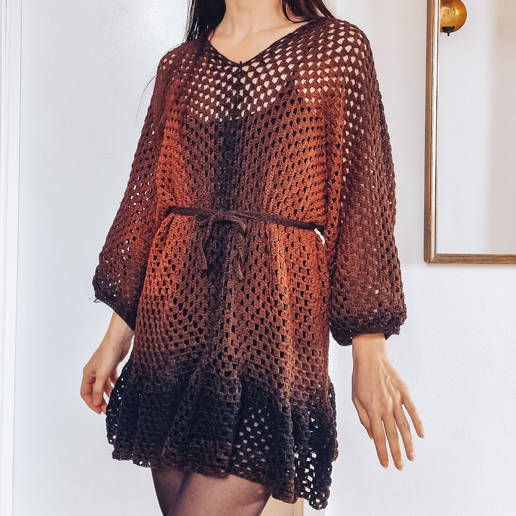 Loops Only Ember crochet cover-up dress with ruffle hem, lightweight and stylish for beach or poolside wear.