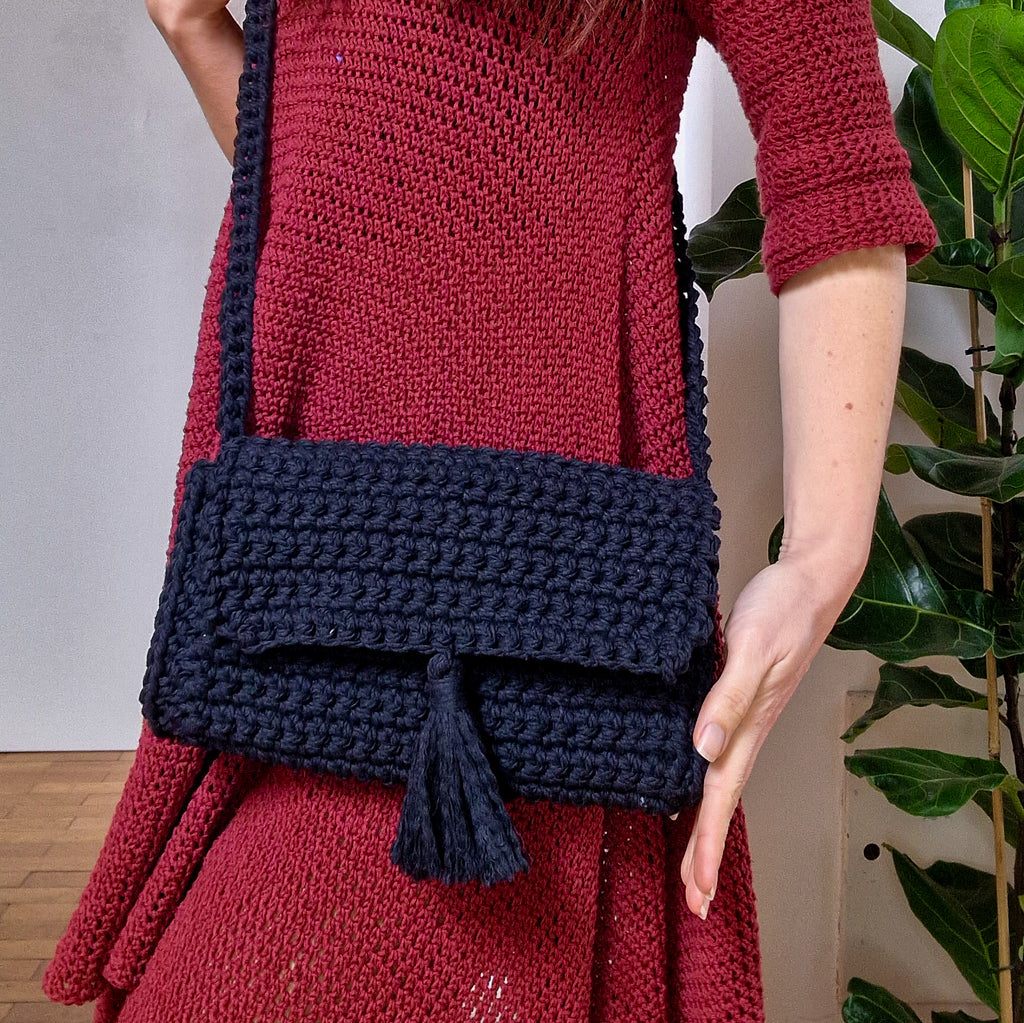 Loops Only Maven Crossbody Purse bag with adjustable strap and stylish design, shown in black leather.