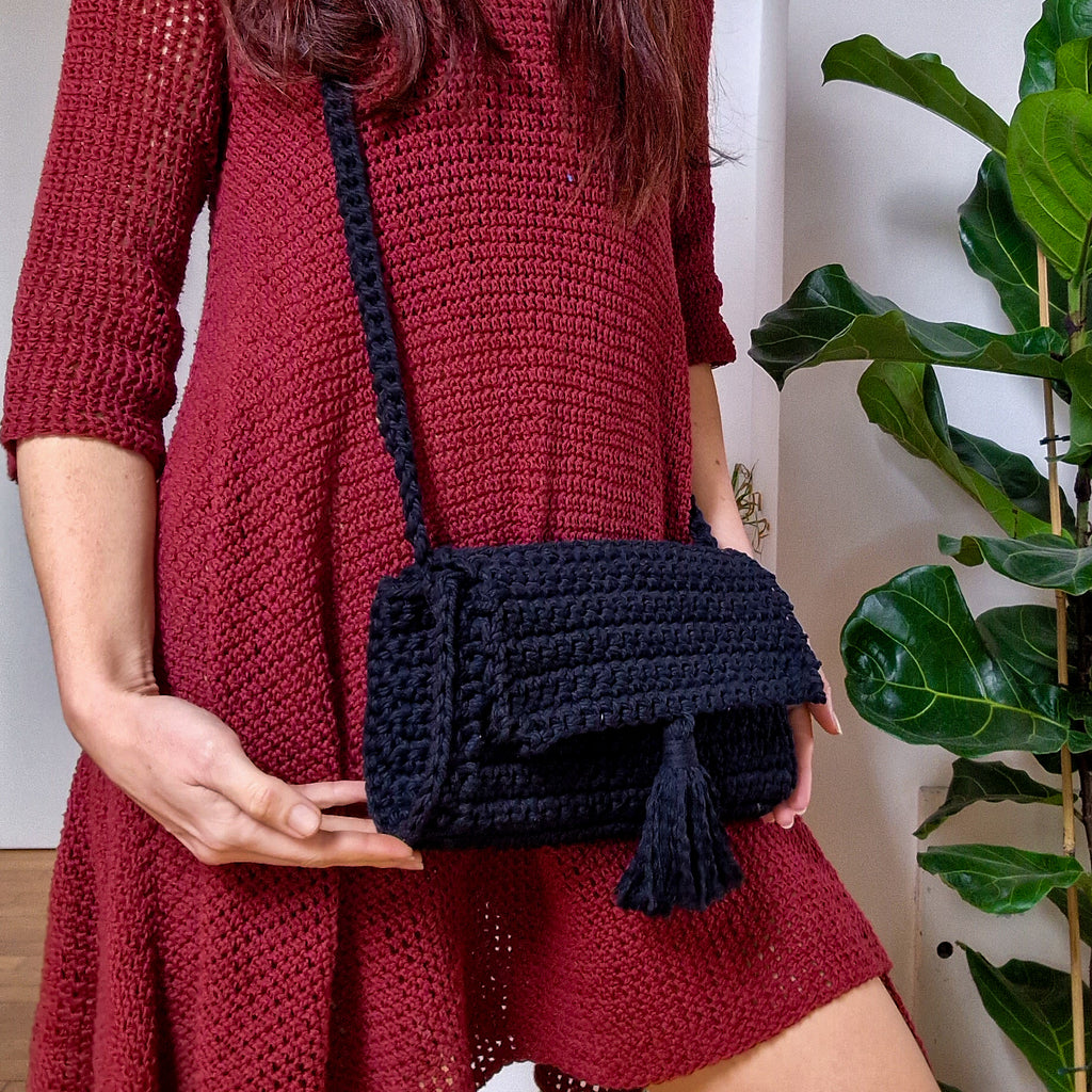 Loops Only Maven Crossbody Purse, stylish bag with adjustable strap and sleek design, displayed on a neutral background.