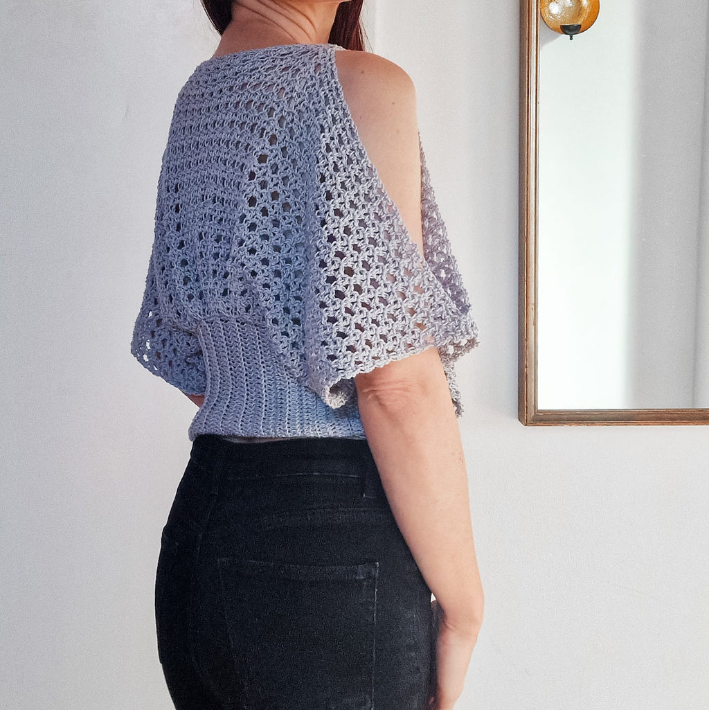 Pearl lace cold shoulder top by Loops Only featuring delicate pearl accents and stylish cold shoulder design.