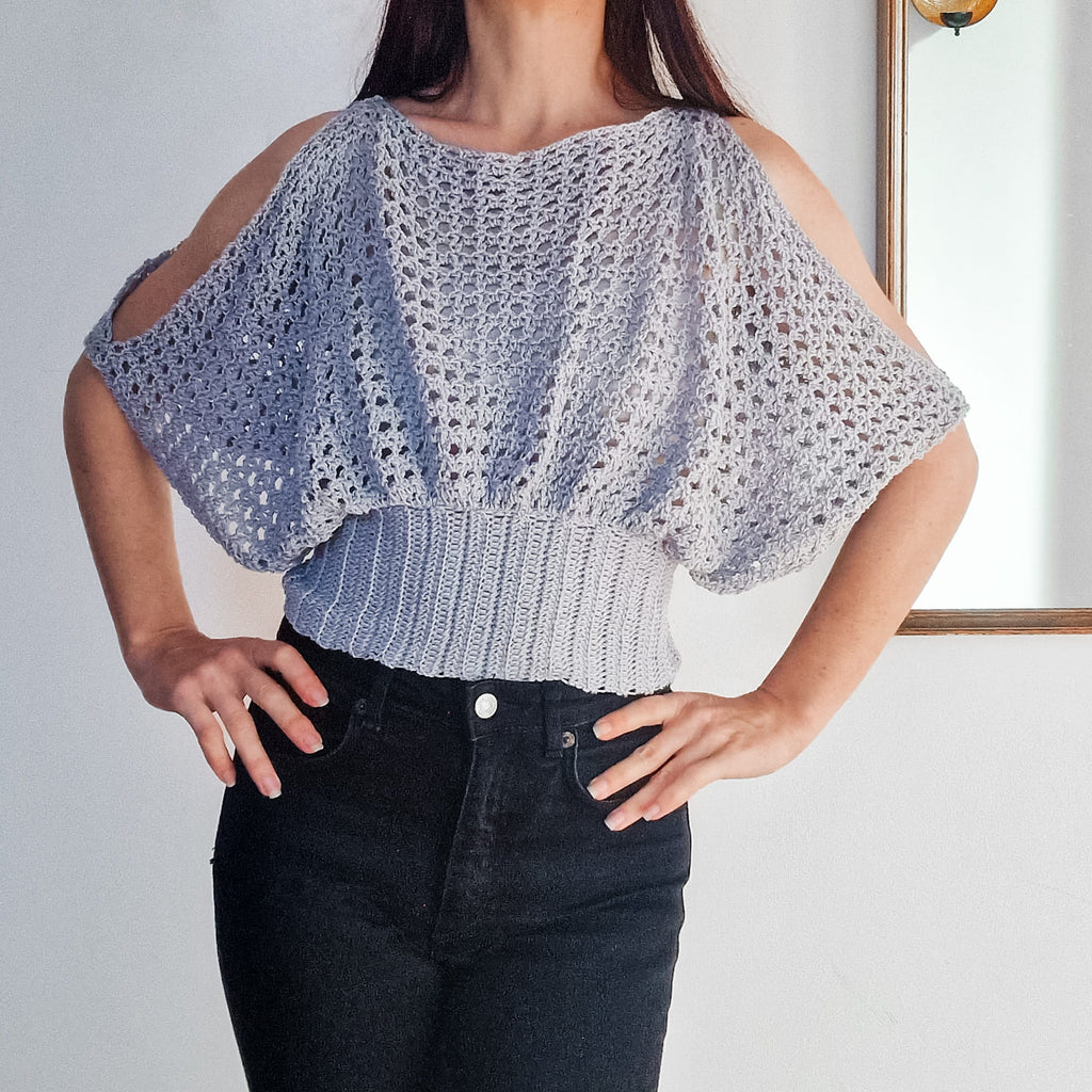 Pearl lace cold shoulder top from Loops Only featuring elegant pearl embellishments and a stylish cold shoulder design.