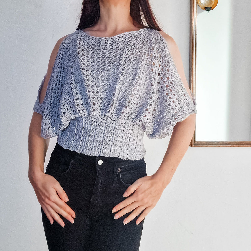 Loops Only pearl lace cold shoulder top featuring delicate lace details and a stylish cold shoulder design.