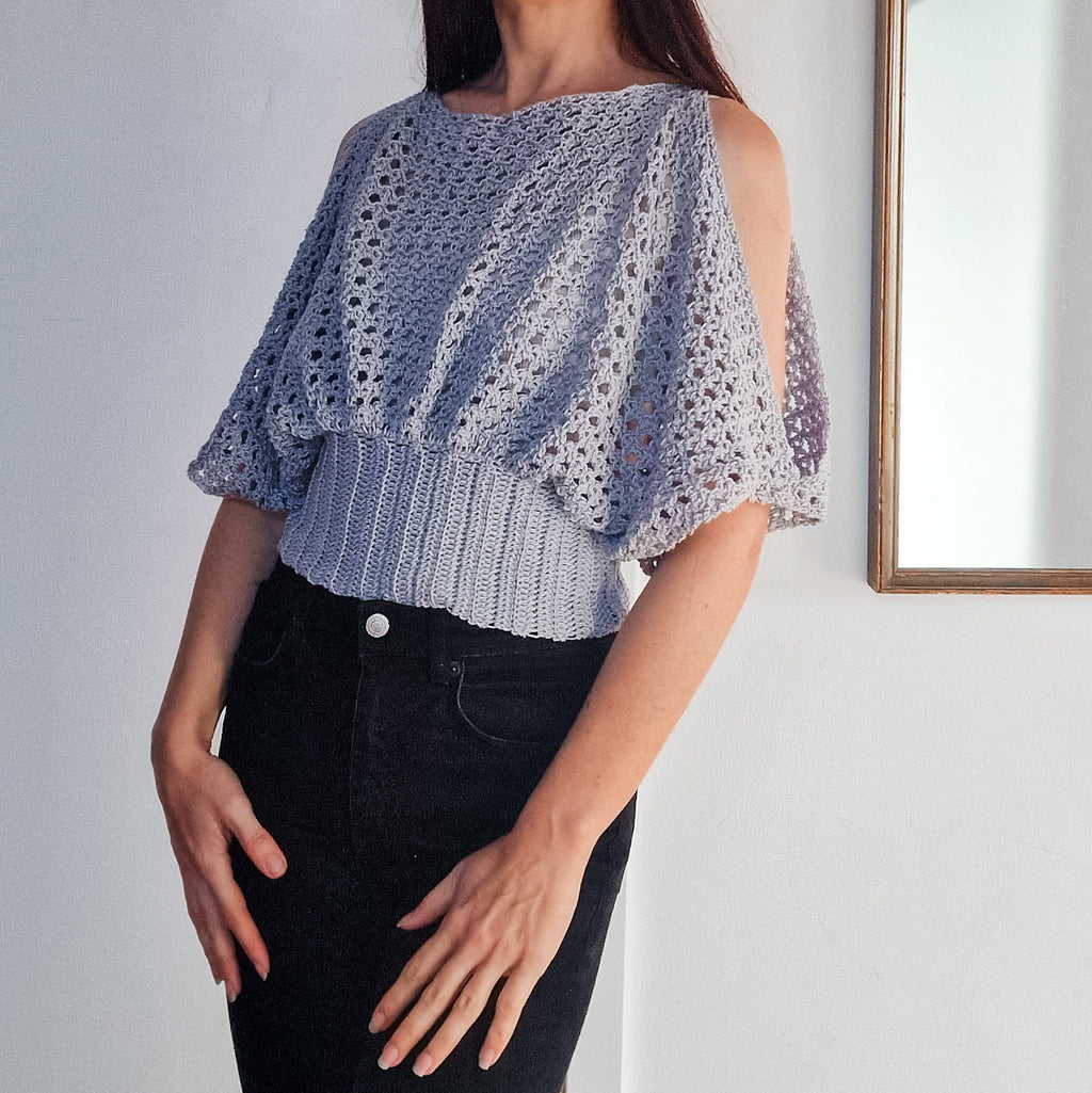 Pearl lace cold shoulder top by Loops Only featuring delicate lace details and stylish cold shoulder design.
