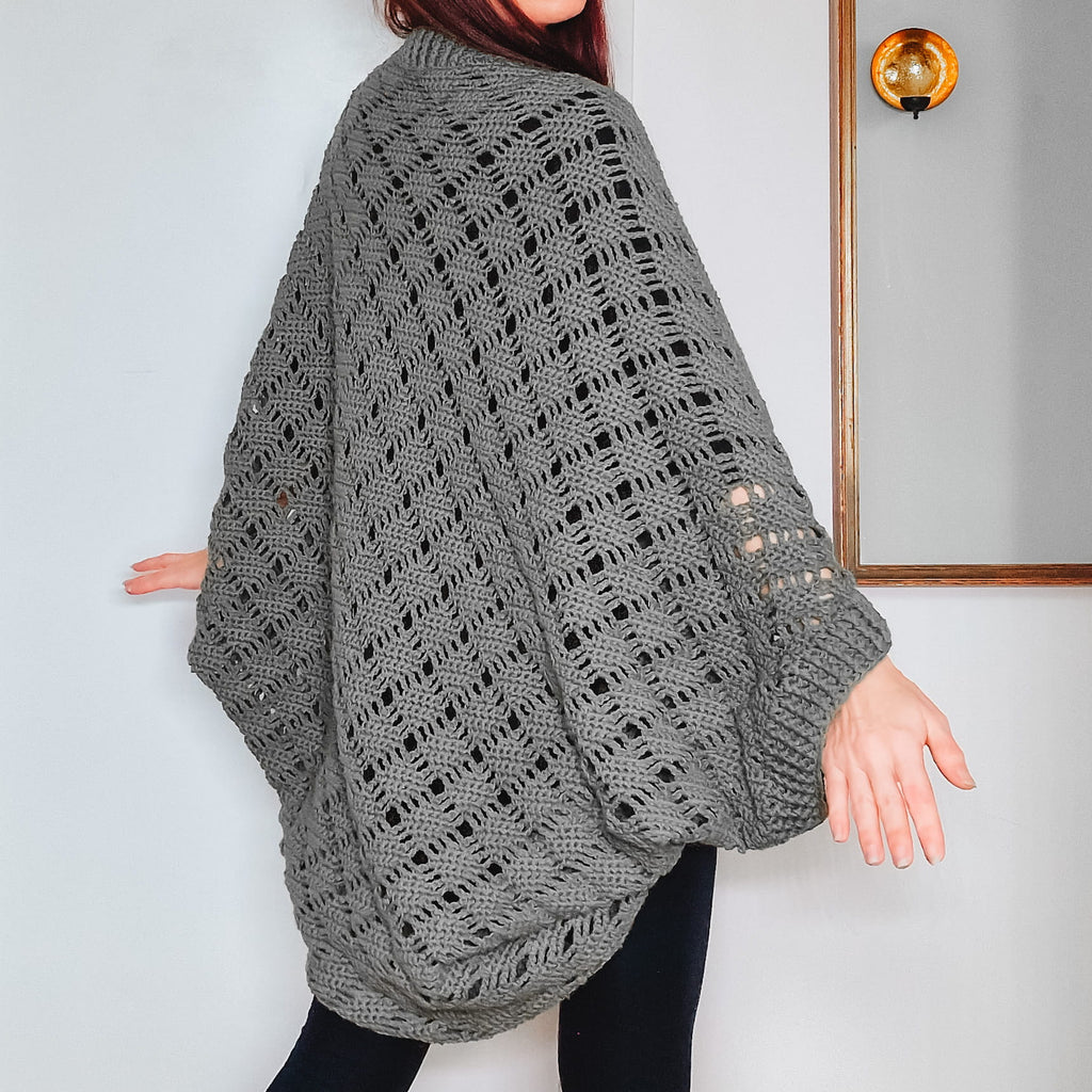 Loops Only Sprig Cocoon Cardigan in soft knit fabric, showcasing its cozy, oversized fit and ribbed cuffs.
