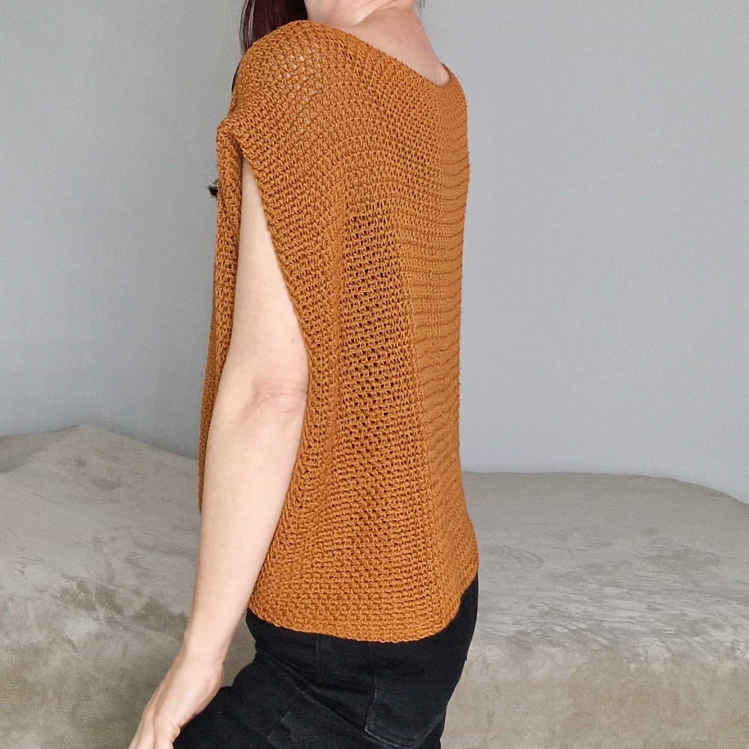 Loops Only Terra cap sleeve oversized top displayed on a hanger, showcasing a casual, relaxed fit with a soft fabric texture.