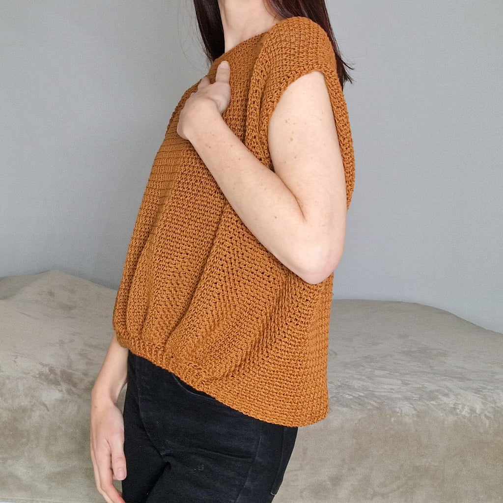 Loops Only Terra cap sleeve oversized top, loose fit with relaxed style, in soft fabric, displayed on a hanger.