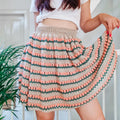Loops Only Rosebud skirt featuring a stylish design, lightweight fabric, and a comfortable fit, perfect for casual or dressy outfits.